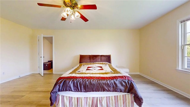 106 Woodsview, Erwin, NY 14870 - bedroom featuring light wood-style flooring, multiple windows, and a ceiling fan