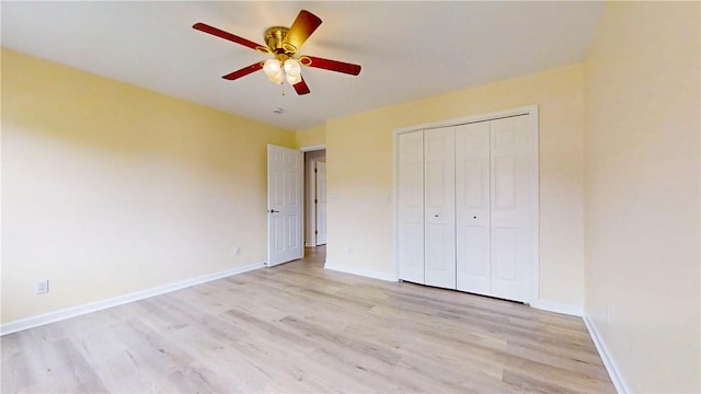 106 Woodsview, Erwin, NY 14870 - unfurnished bedroom featuring light wood finished floors, a closet, and a ceiling fan