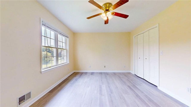 106 Woodsview, Erwin, NY 14870 - unfurnished bedroom featuring light wood finished floors, a closet, and ceiling fan