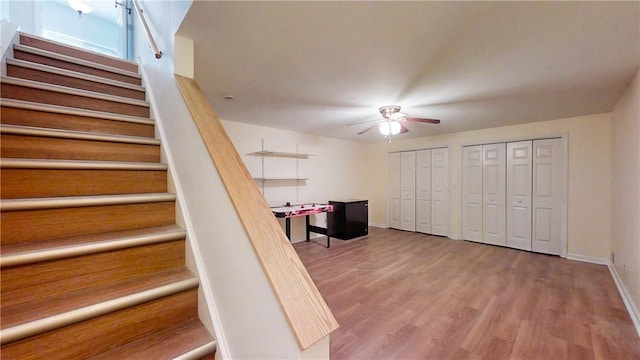 106 Woodsview, Erwin, NY 14870 - staircase with a ceiling fan and wood finished floors