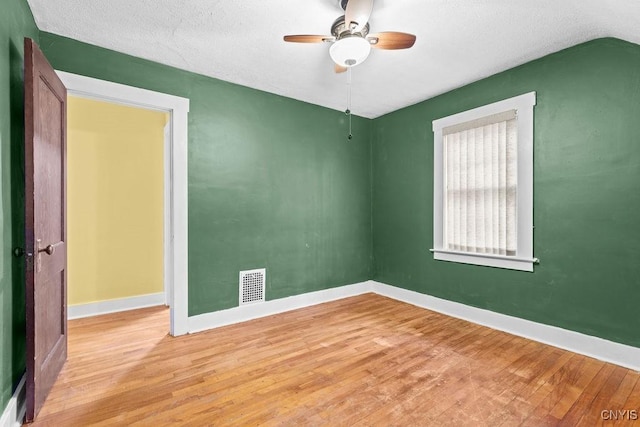 500 Glenwood Ave, Syracuse, NY 13207 - empty room with wood finished floors and a ceiling fan