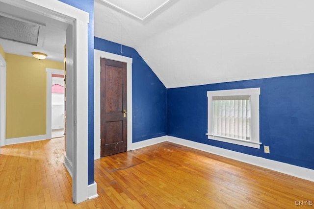 500 Glenwood Ave, Syracuse, NY 13207 - additional living space with attic access, hardwood / wood-style flooring, and lofted ceiling