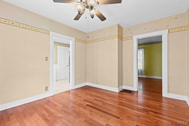 500 Glenwood Ave, Syracuse, NY 13207 - spare room featuring wood finished floors and a ceiling fan