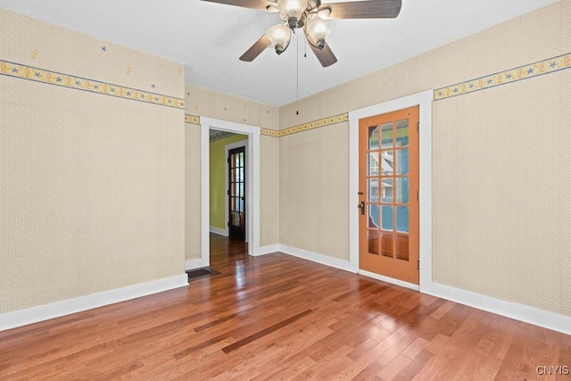 500 Glenwood Ave, Syracuse, NY 13207 - spare room featuring wood finished floors and a ceiling fan