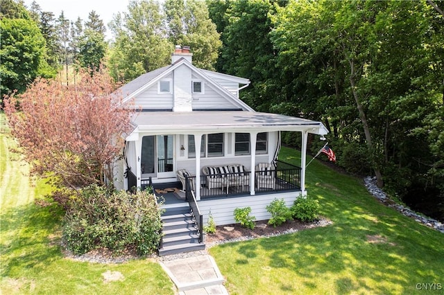 2489 E Lake Rd, Spafford, NY 13152 - view of front of home with stairs, a front lawn, and a chimney