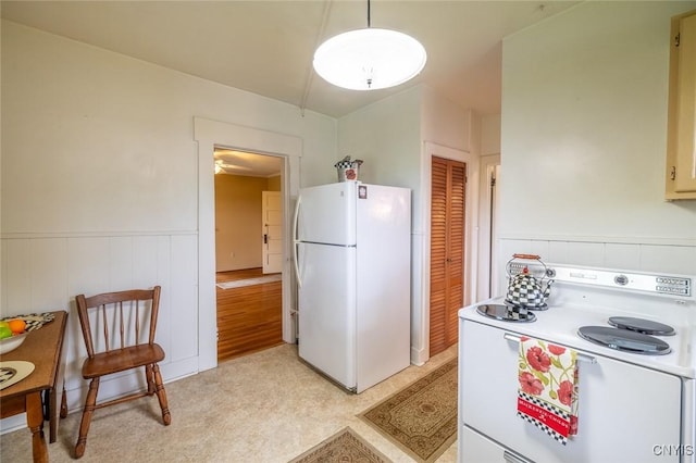 810 Franklin St, Skaneateles, NY 13152 - kitchen with white appliances, wainscoting, and light flooring