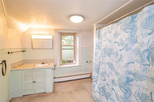 810 Franklin St, Skaneateles, NY 13152 - full bath with a baseboard heating unit, vanity, and a shower with shower curtain
