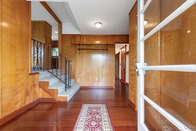 4581 Nelson Rd, Fenner, NY 13035 - foyer with wooden walls, wood finished floors, and stairs