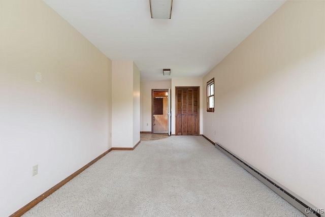 4581 Nelson Rd, Fenner, NY 13035 - spare room featuring a baseboard radiator and light carpet