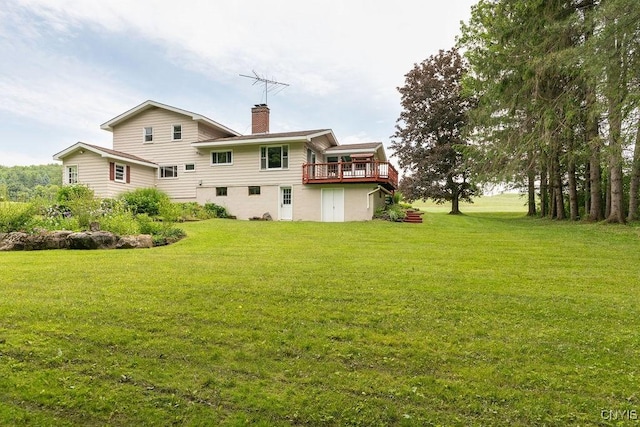 4581 Nelson Rd, Fenner, NY 13035 - rear view of house featuring a lawn, a wooden deck, and a chimney