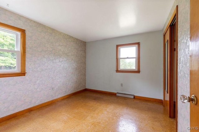 4581 Nelson Rd, Fenner, NY 13035 - spare room featuring light flooring and a baseboard heating unit