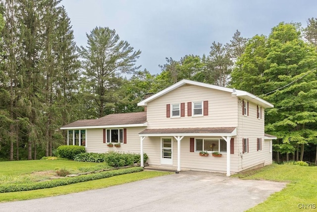 4581 Nelson Rd, Fenner, NY 13035 - view of front of property with a front lawn, covered porch, and roof with shingles