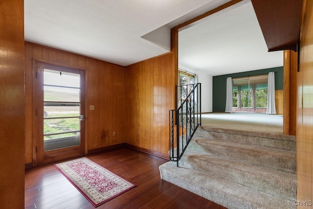 4581 Nelson Rd, Fenner, NY 13035 - entryway with wood finished floors, stairs, and wooden walls