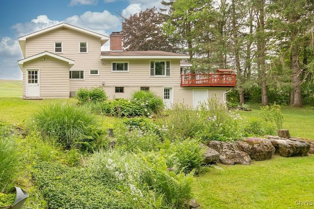 4581 Nelson Rd, Fenner, NY 13035 - rear view of property with a deck, a lawn, and a chimney