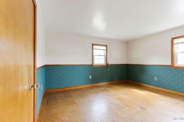 4581 Nelson Rd, Fenner, NY 13035 - unfurnished room with plenty of natural light, tile patterned floors, and wallpapered walls