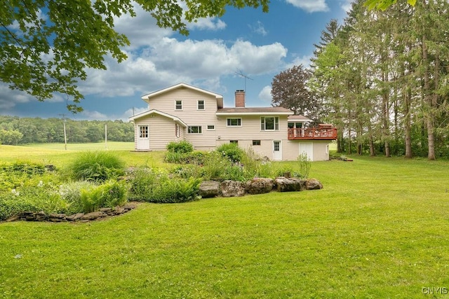 4581 Nelson Rd, Fenner, NY 13035 - rear view of house featuring a yard, a deck, and a chimney