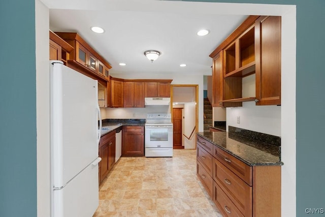 4581 Nelson Rd, Fenner, NY 13035 - kitchen featuring white appliances, exhaust hood, open shelves, brown cabinetry, and dark stone counters