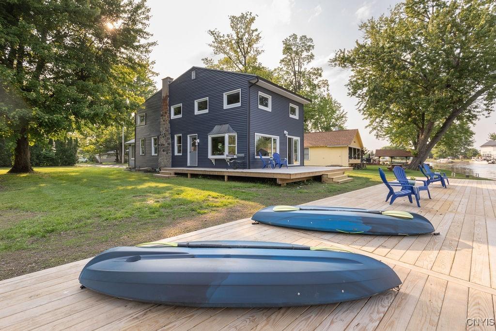 8512 Tuttle Rd, Cicero, NY 13030 - back of house with a wooden deck and a yard