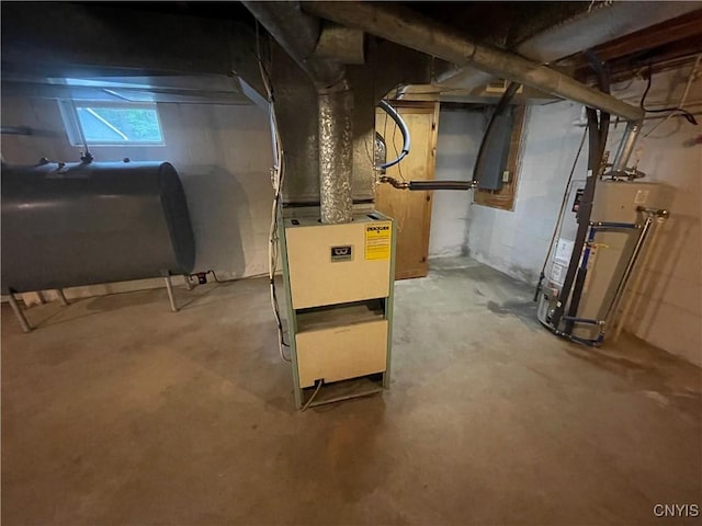 8054 Sand Pond Rd, Greig, NY 13343 - basement featuring heating fuel, water heater, and heating unit