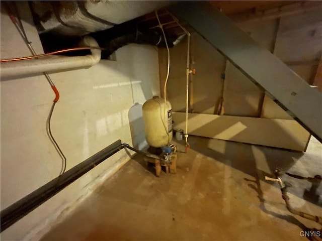 8054 Sand Pond Rd, Greig, NY 13343 - unfinished basement featuring a water pressure tank