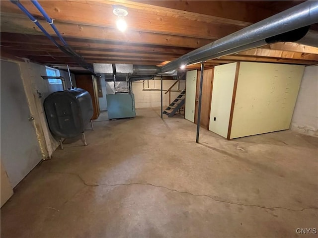 8054 Sand Pond Rd, Greig, NY 13343 - unfinished basement featuring heating fuel, stairway, and heating unit