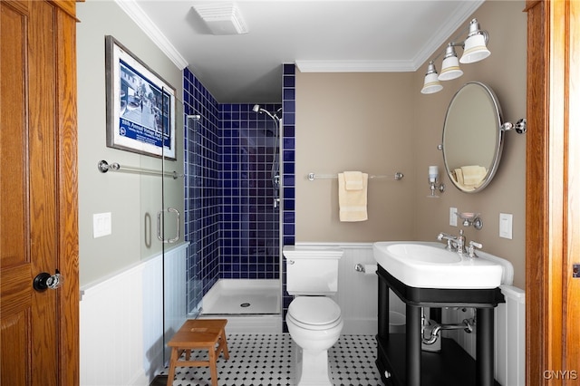 23986 Smith Rd, Alexandria, NY 13607 - bathroom featuring a shower stall, crown molding, tile patterned floors, and a wainscoted wall