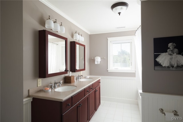 23986 Smith Rd, Alexandria, NY 13607 - bathroom with a wainscoted wall, radiator heating unit, double vanity, ornamental molding, and tile patterned flooring