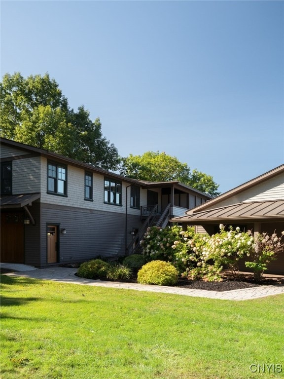 23986 Smith Rd, Alexandria, NY 13607 - view of front of home with a front lawn and stairway