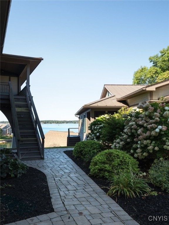 23986 Smith Rd, Alexandria, NY 13607 - view of side of property with stairs and a water view