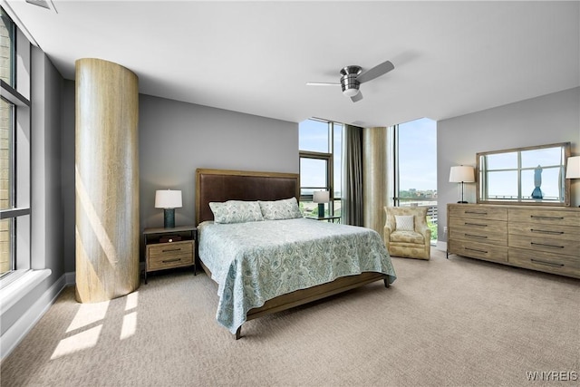 132 Lakefront Blvd Unit 804, Buffalo, NY 14202 - carpeted bedroom featuring multiple windows and a ceiling fan
