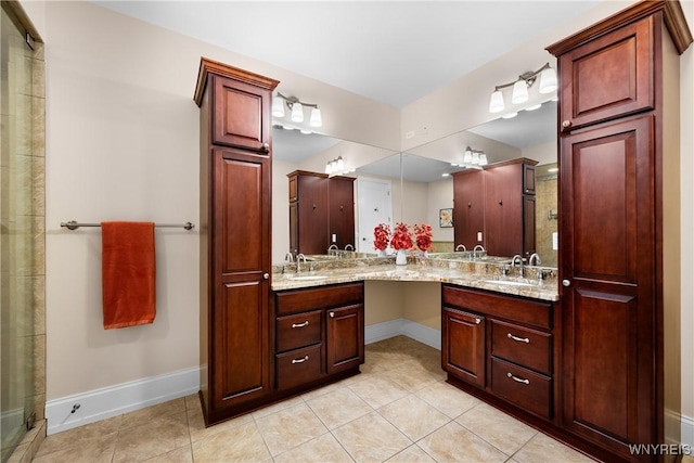 132 Lakefront Blvd Unit 804, Buffalo, NY 14202 - bathroom featuring double vanity, tile patterned floors, and a shower with door