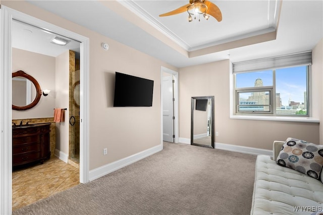 132 Lakefront Blvd Unit 804, Buffalo, NY 14202 - carpeted living room featuring a tray ceiling, ornamental molding, and ceiling fan