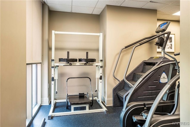 132 Lakefront Blvd Unit 804, Buffalo, NY 14202 - workout room featuring a paneled ceiling and baseboards