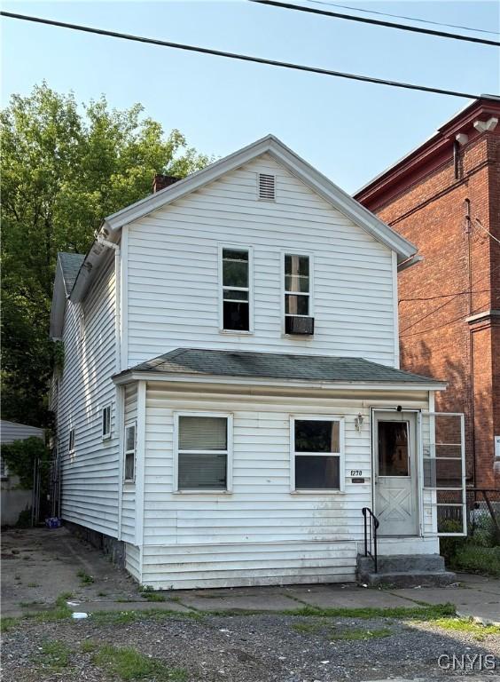 1230 Francis St, Utica, NY 13502 - back of property with entry steps and a shingled roof
