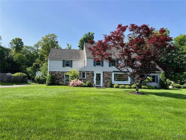 6 Glencrest Blvd, New Hartford, NY 13413 - view of front facade featuring stone siding and a chimney