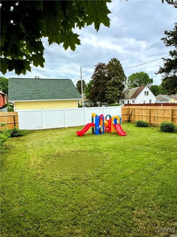 373 S Collingwood Ave, Syracuse, NY 13206 - fenced backyard featuring a playground