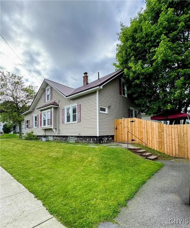 373 S Collingwood Ave, Syracuse, NY 13206 - view of front of property with a chimney and a metal roof