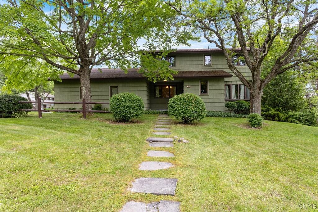 704 Hamilton Pkwy, Dewitt, NY 13214 - view of front of house featuring a front yard