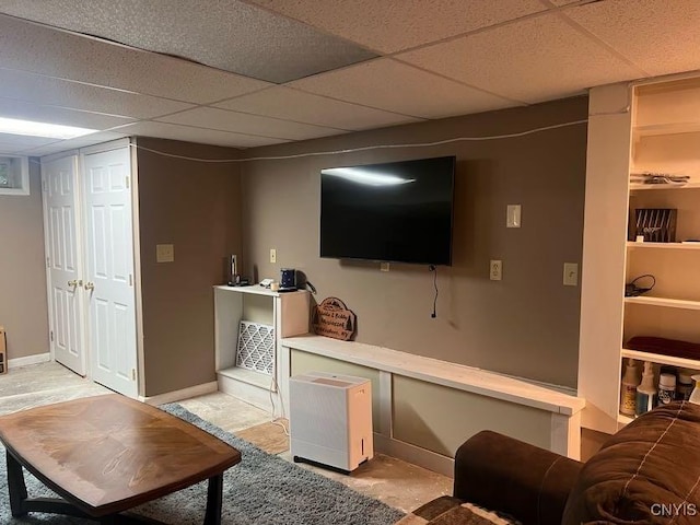 60 Cambridge Rd, Whitestown, NY 13492 - living area featuring a paneled ceiling and baseboards