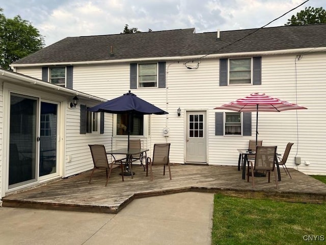 60 Cambridge Rd, Whitestown, NY 13492 - back of property with outdoor dining space and a wooden deck