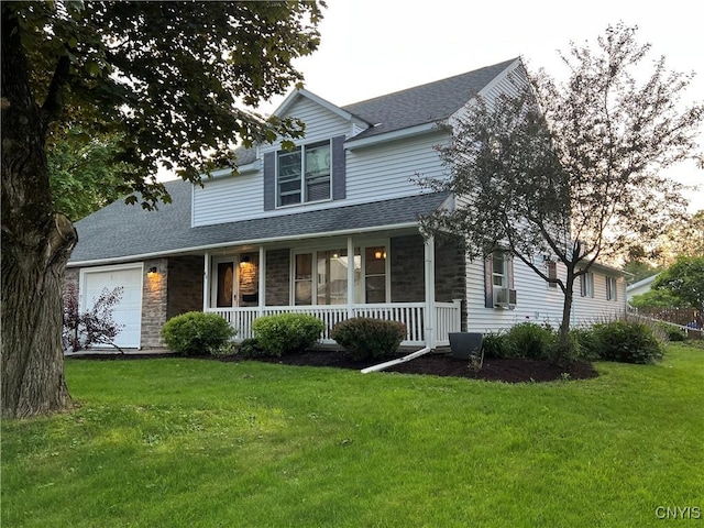 60 Cambridge Rd, Whitestown, NY 13492 - traditional home with covered porch, a shingled roof, stone siding, a front yard, and an attached garage