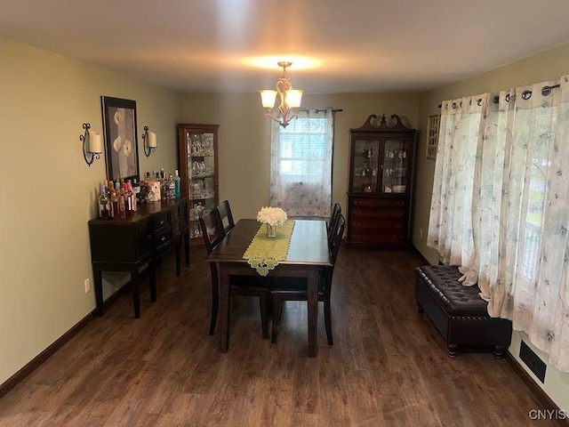 60 Cambridge Rd, Whitestown, NY 13492 - dining space featuring a chandelier and dark wood-type flooring