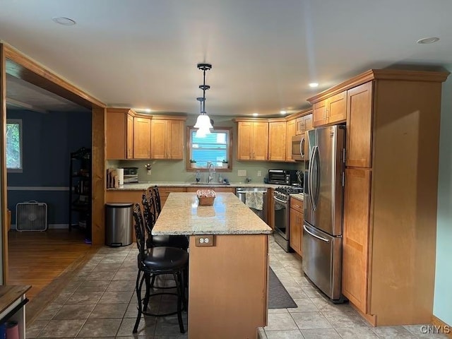 60 Cambridge Rd, Whitestown, NY 13492 - kitchen featuring appliances with stainless steel finishes, a kitchen island, a kitchen bar, recessed lighting, and light tile patterned floors