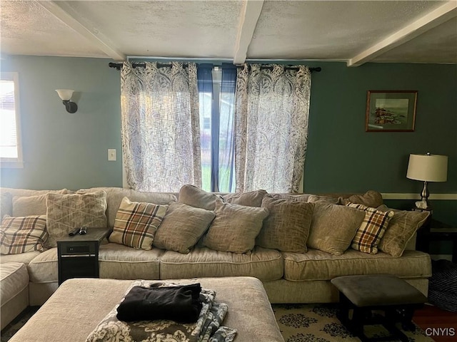 60 Cambridge Rd, Whitestown, NY 13492 - living room featuring beamed ceiling and a textured ceiling