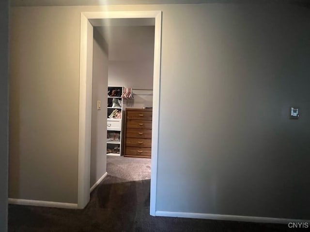 60 Cambridge Rd, Whitestown, NY 13492 - hallway featuring dark colored carpet and baseboards