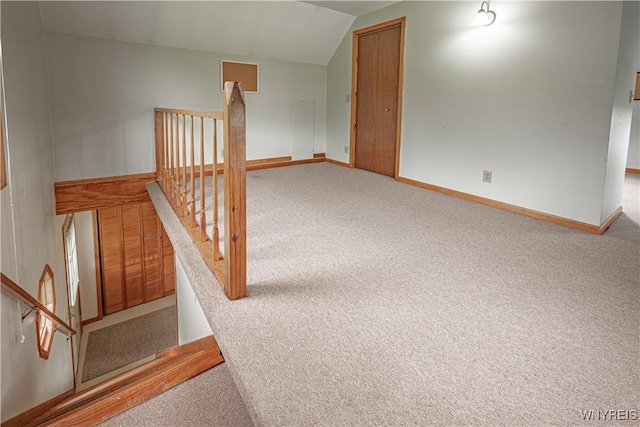 4724 Wilson Burt Rd, Wilson, NY 14172 - staircase featuring carpet floors and vaulted ceiling