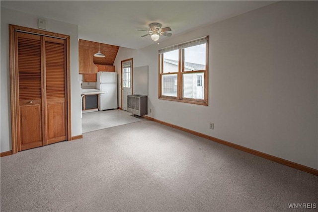 4724 Wilson Burt Rd, Wilson, NY 14172 - unfurnished living room featuring ceiling fan and heating unit