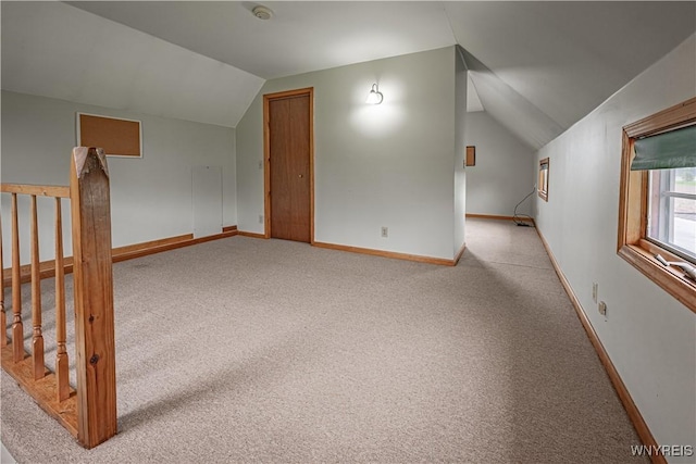 4724 Wilson Burt Rd, Wilson, NY 14172 - additional living space with vaulted ceiling and carpet floors