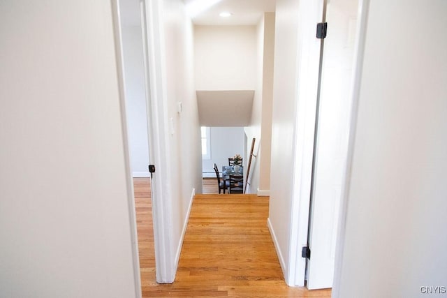 4114 Wetzel Rd, Clay, NY 13090 - hall featuring light wood-style flooring and baseboards