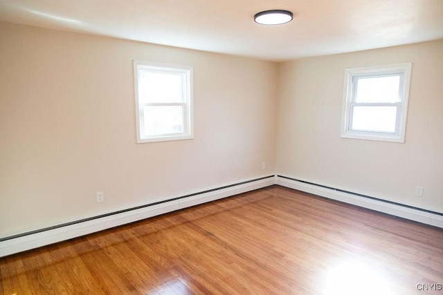 4114 Wetzel Rd, Clay, NY 13090 - empty room with wood finished floors